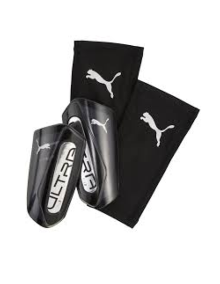 Puma ultra espinilleras flex negro